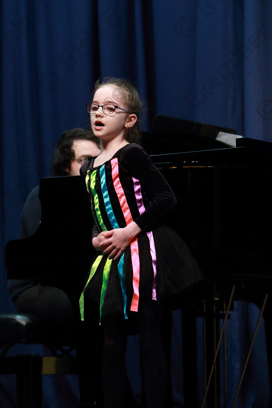 Feis11022020Tues08 
 8
Emily Blackshields from Lehenaghmore singing Winnie The Pooh accompanied by Tom Doyle.

Class: 115: “The Michael O’Callaghan Memorial Perpetual Cup” Solo Action Song 8 Years and Under

Feis20: Feis Maitiú festival held in Father Mathew Hall: EEjob: 11/02/2020: Picture: Ger Bonus.