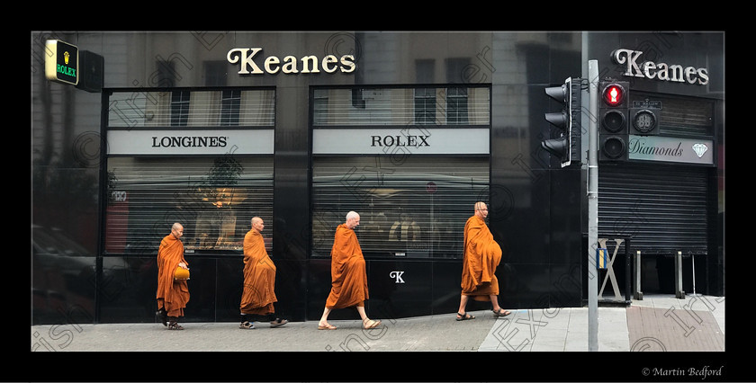IMG 0055 
 On my way to work I spotted four Buddhist Monks taking a morning stroll in Limerick this morning. Choosing to ignore the luxury store Keanes Jewellers to abide by their lifestyle choices of living without luxurys. I only had my smart phone with me so I grabbed a shot as quick as I could 
Image ? Martin Bedford