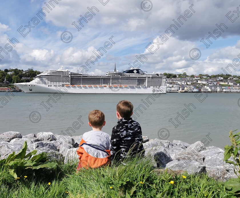 IMG 20230509 155643 edit 348153977910415 
 Welcome to Cork! Felix and Alastair watching on as the MSC Preziosa, carrying 4,378 cruisers, pulls in to Cobh.