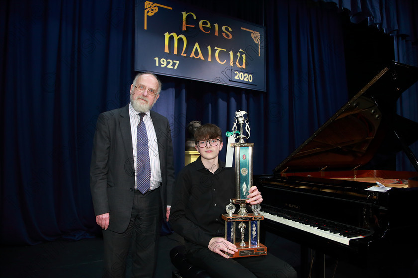 Feis06022020Thurs40 
 40
Adjudicator Dr Michael Ball completes his tenure with the presentation to the Winner, Karl Riedewald from Douglas.

Class:154: “The Theo. Gmur Memorial Bursary” Bursary Value €80 Sponsored by Feis Maitiú Junior Piano Prizewinners Qualifying Programme.

Feis20: Feis Maitiú festival held in Father Mathew Hall: EEjob: 06/02/2020: Picture: Ger Bonus.