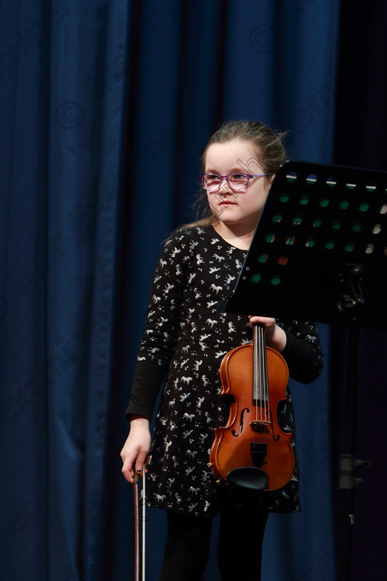 Feis0402109Mon26 
 25~26
Lily O’Keeffe performing set piece.

Class: 242: Violin Solo 8 Years and Under (a) Carse–Petite Reverie (Classical Carse Bk.1) (b) Contrasting piece not to exceed 2 minutes.

Feis Maitiú 93rd Festival held in Fr. Matthew Hall. EEjob 04/02/2019. Picture: Gerard Bonus