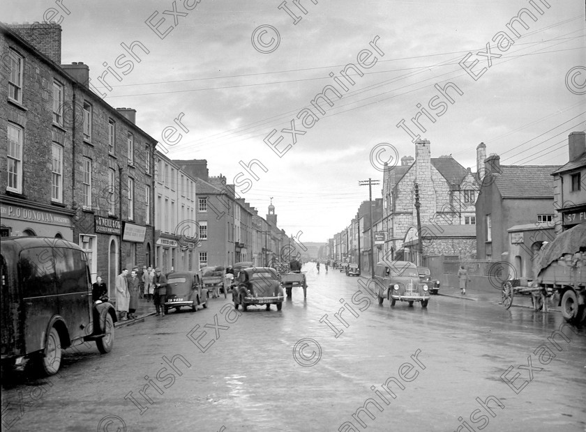 798133 798133 
 For 'READY FOR TARK'
Main Street, Midleton in 1938 Ref. 327G Old black and white towns