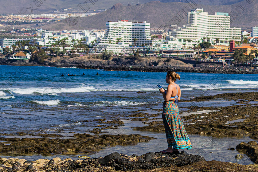 Taking it all in-9131 
 "Taking it all in"!! at Playa de Las Americas Tenerife recently 
 Keywords: Tenerife, girl, surfers