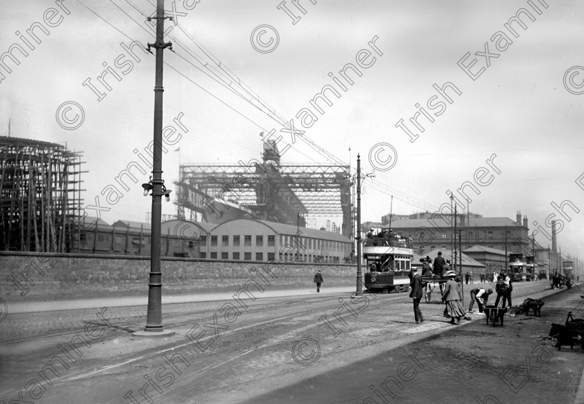 434940 
 Please archive -
The Harland and Wolf shipyards in Belfast when the liner RMS Titanic was under construction. The keel was laid on 31/03/1909 and the ship was completed on 2/04/1912. Ten days later, on its maiden voyage, the liner struck an iceberg. Of the 2228 passangers and crew aboard only 705 survived. 
Ref.114/115 
Old black and white ships liners disasters