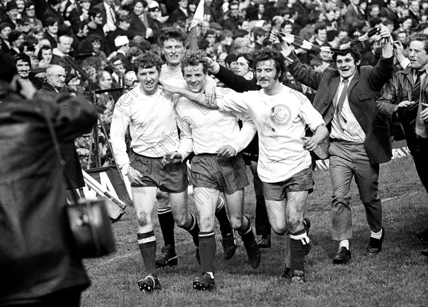 430450 
 Cork Hibernians players (from left) Frank Connolly, Joe O'Grady, Miah Dennehy and John Lawson celebrate after they won the League of Ireland play-off decider against Shamrock Rovers at Dalymount Park, Dublin.
26/04/1971 Ref. 126/3
100 Cork Sporting Heroes Old black and white