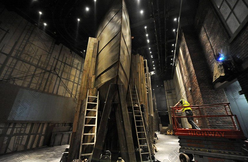 Titanic Belfast Preview 6 
 Alan Lewis - PhotopressBelfast.co.uk 14/3/2012
Mandatory Credit - Picture by Justin Kernoghan
A replica of the Titanic's bow, just one of the many replica items in the 'shipyard ride' in Gallery Two (The Arrol Gantry). The Shipyard Ride - Believed to be the first of it's kind, the ride is a five minute journey in a six seater car (pictured top with number 1 on side) that rotates and moves up and down along a circuit accompanied by CGI, audio and special effects. Surrounded by full-size replicas, including riveting machines and Titanic's rudder, give a scale perspective into working life on the shipyard. The original Arrol Gantry was 840ft long, 240ft wide and 228ft high, and was in use until the 1960s. 
Press Release
Opening in March 2012, Titanic Belfast® will be a "must see" visit in any tour of Belfast and Northern Ireland. It is located in the heart of Belfast, on the slipways where RMS Titanic was built.
Inside this iconic building, visitors will re-live the entire Titanic story from her birth in Belfast to the fateful maiden voyage and her eventual discovery on the seabed.
Titanic Belfast® extends over nine galleries, with multiple dimensions to the exhibition, drawing together special effects, dark rides, full-scale reconstructions and innovative interactive features to explore the Titanic story in a fresh and insightful way; from her conception in Belfast in the early 1900s, through her construction and launch, to her infamous maiden voyage and catastrophic demise. The journey goes beyond the aftermath of the sinking, to the discovery of the wreck and continues into the present day with a live undersea exploration centre. 
Further info contact Jonathan King - 028 90339949/07764 627 297
Embargoed until 17.00 Wednesday 14th March 2012 
 Keywords: Alan Lewis 00447850 988920, Justin Kernoghan 00447525 763088, Photopress Belfast